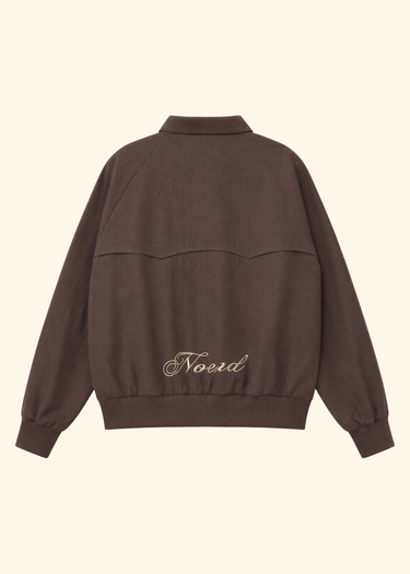 A dark brown cropped sweatshirt with a mock neck, long sleeves, and a small white embroidered 'Nord' logo on the back, shown against a solid cream background.