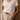 Light beige Supima cotton V-neck tee from Noend Denim, shown on a hanger, highlighting its soft fabric and classic fit.