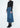 Noend Denim Rachel Utility Maxi Skirt in denim, featuring a flowy design and side pockets, displayed on a hanger.