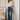 Noend Denim Farrah Mid Rise Kick Flare jeans with bootcut style, shown in dark wash with front pockets and flared leg opening.