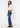 Noend Denim Farrah Mid Rise Kick Flare jeans in dark wash, showcasing the bootcut style with a fitted waist and flared leg opening.