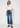 Noend Denim Farrah Mid Rise Kick Flare jeans shown with a bootcut and flared silhouette, light blue denim fabric, front and back views.