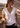 Cream Supima Cotton Deep V-Neck Tee by Noend Denim, showcasing a close-up of the soft, fitted top with a deep V neckline.