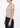 Noend Denim Supima cotton deep V-neck tee, a soft, fitted top with a V-neck design, shown in a neutral color.