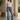 Scarlett Mid Rise Flare jeans by Noend Denim featuring a classic bootcut and flare design, shown on a model.