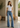 Scarlett Mid Rise Flare jeans by Noend Denim featuring a classic bootcut and flare design, shown on a model.